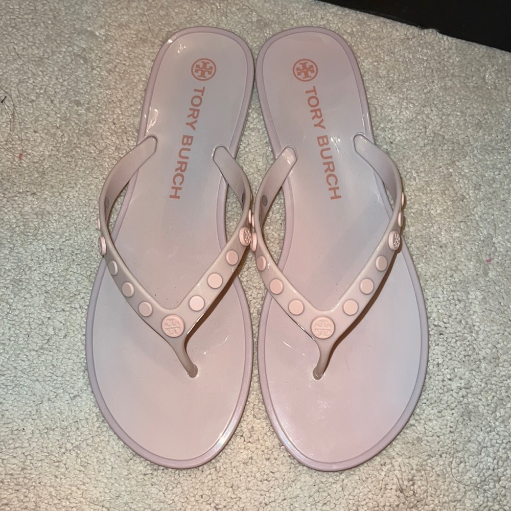 Tory Burch plastic flip-flops.